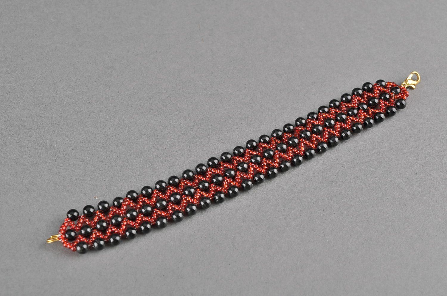 Armband aus Glasperlen Hälften vom Rhombus foto 3