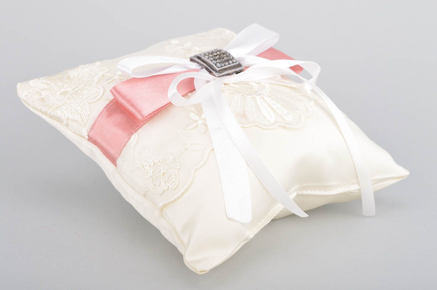 Homemade wedding ring pillow sewn of white satin with lace and pink ribbon photo 2
