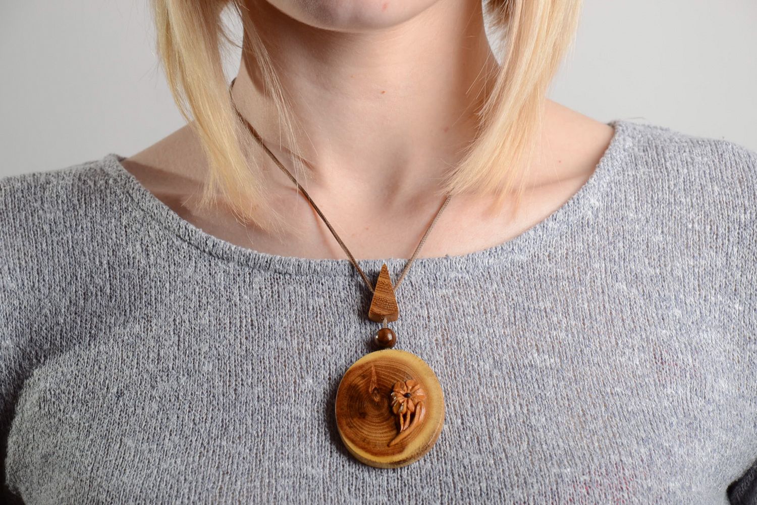 Large handmade varnished wooden neck pendant of oval shape with cord for women photo 2