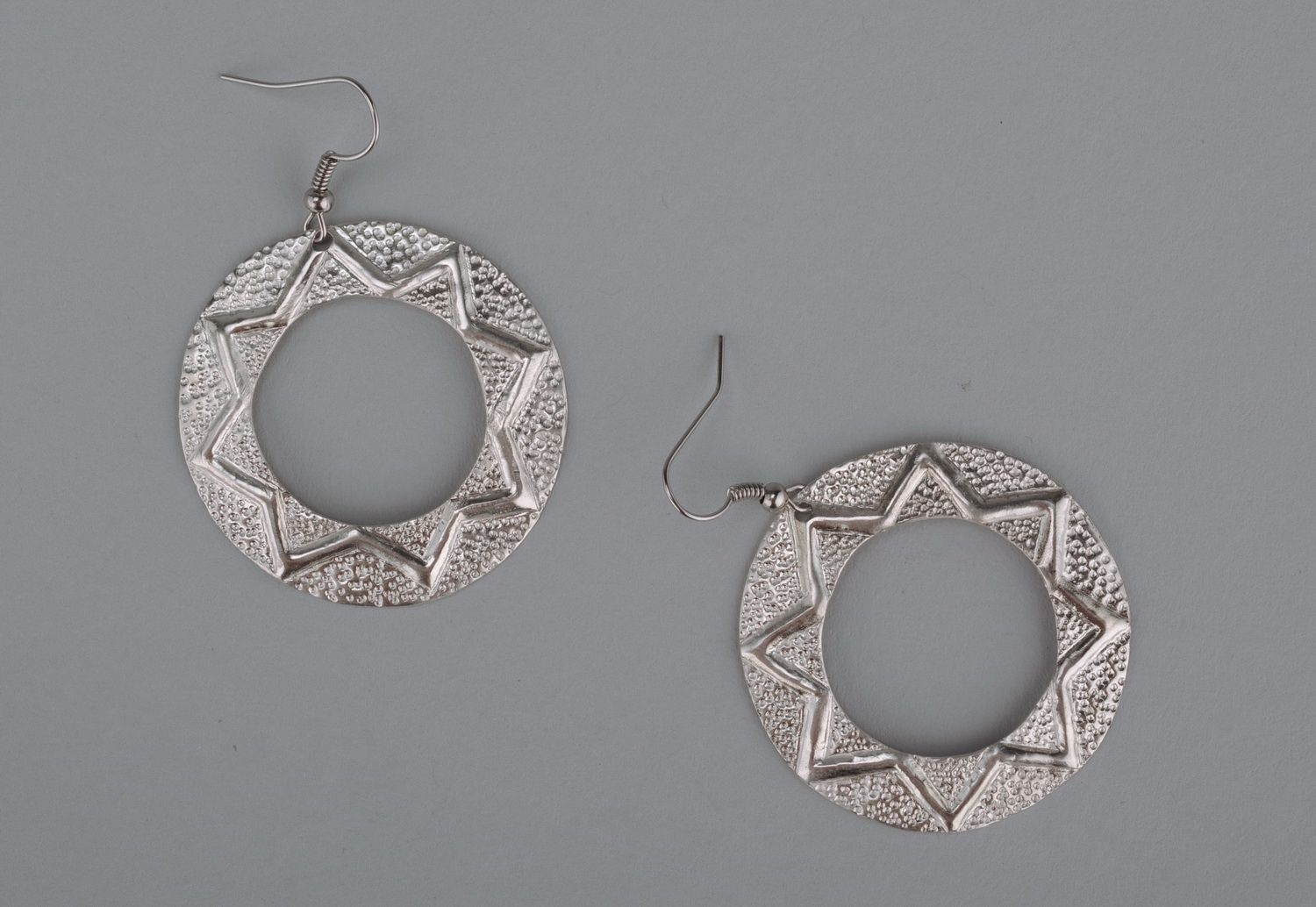 Metal earrings with silvering photo 1