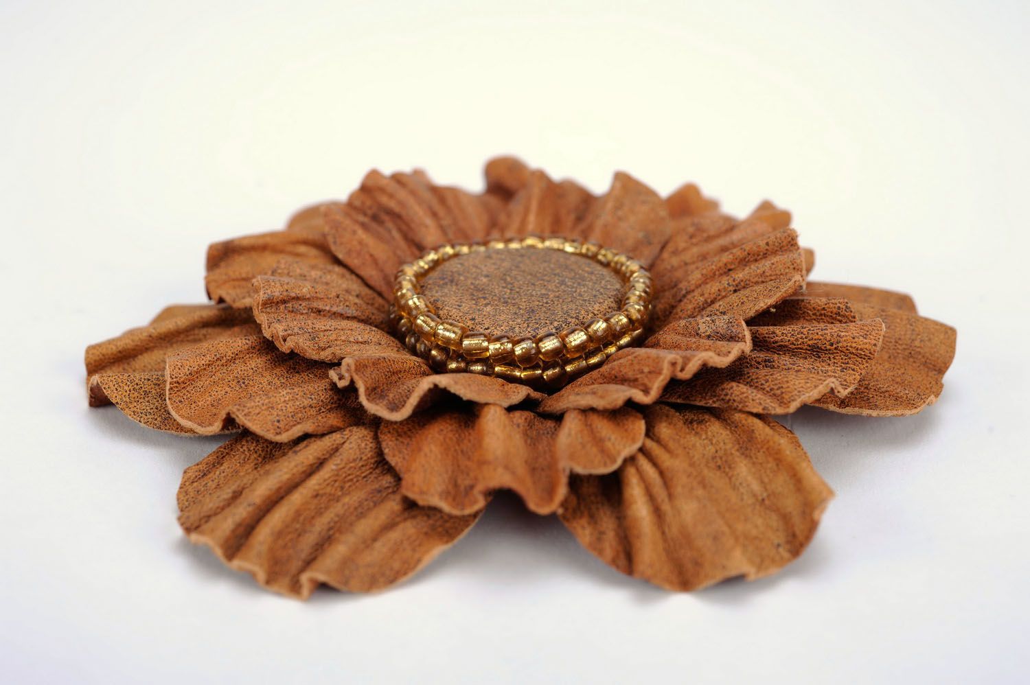 Light brown leather brooch photo 1