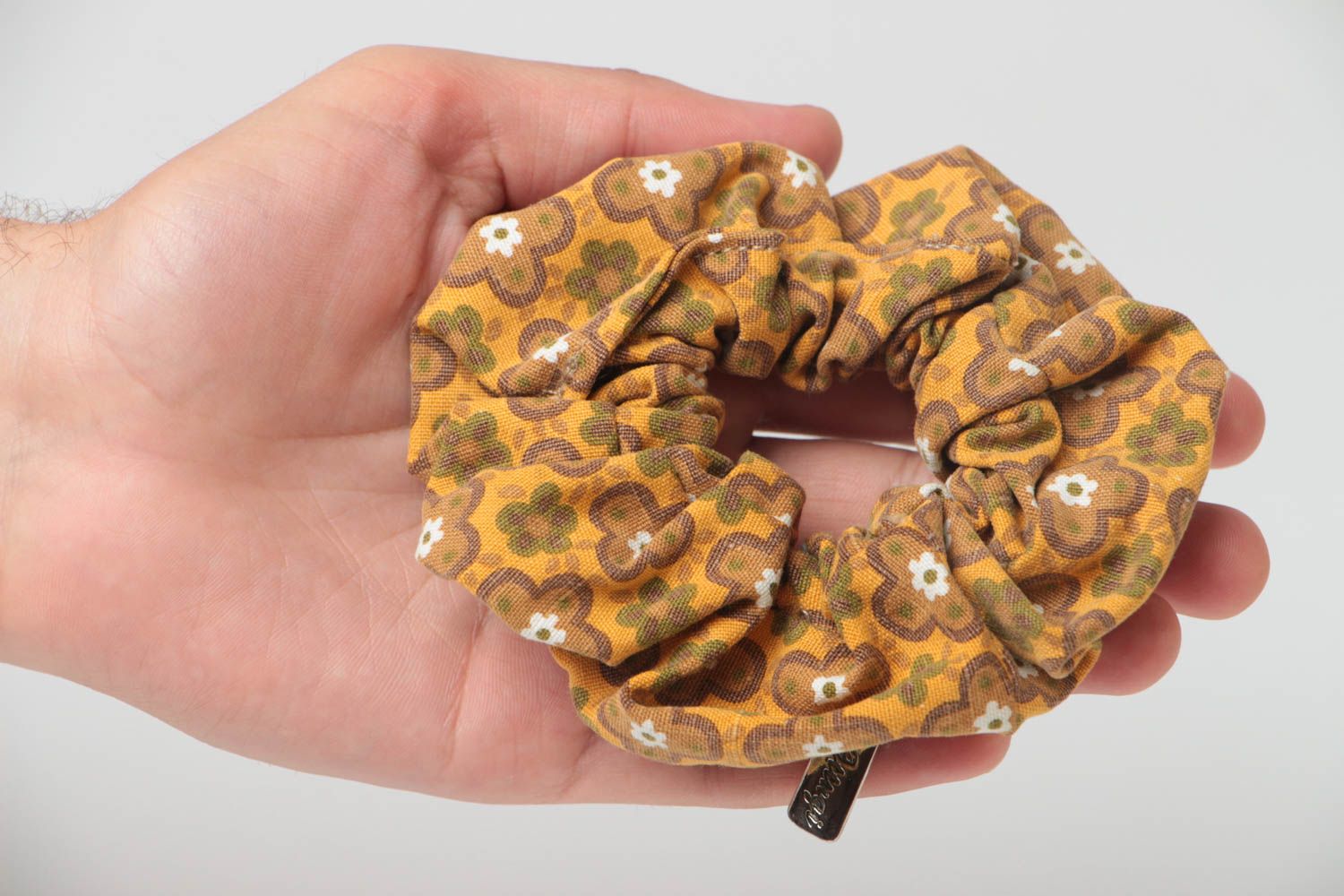 Decorative handmade volume hair tie sewn of yellow and brown cotton fabric photo 5