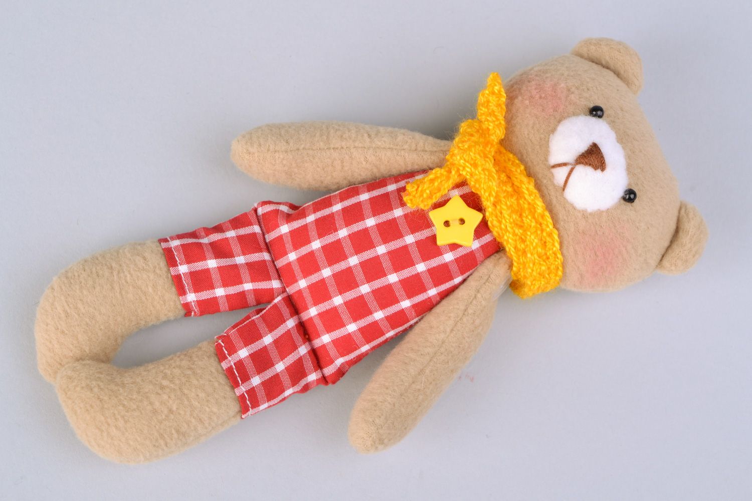 Handmade designer soft toy sewn of fleece Bear in checkered suit with yellow scarf photo 1