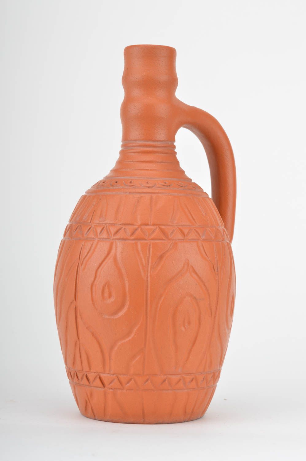 Botella de arcilla decorativa artesanal marrón clara con ornamento 330 ml foto 2
