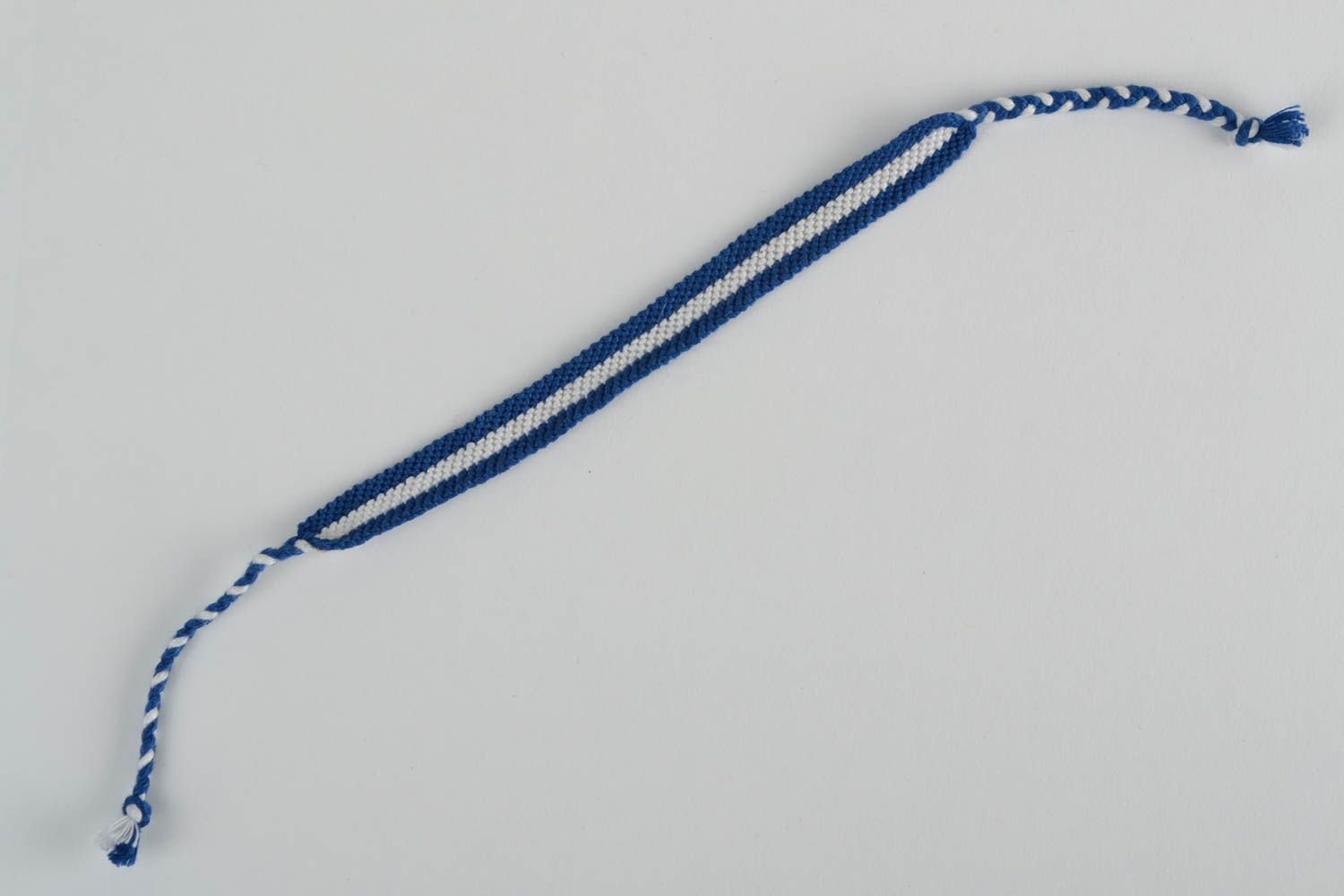 Handmade thin friendship wrist bracelet woven of blue and white threads photo 5