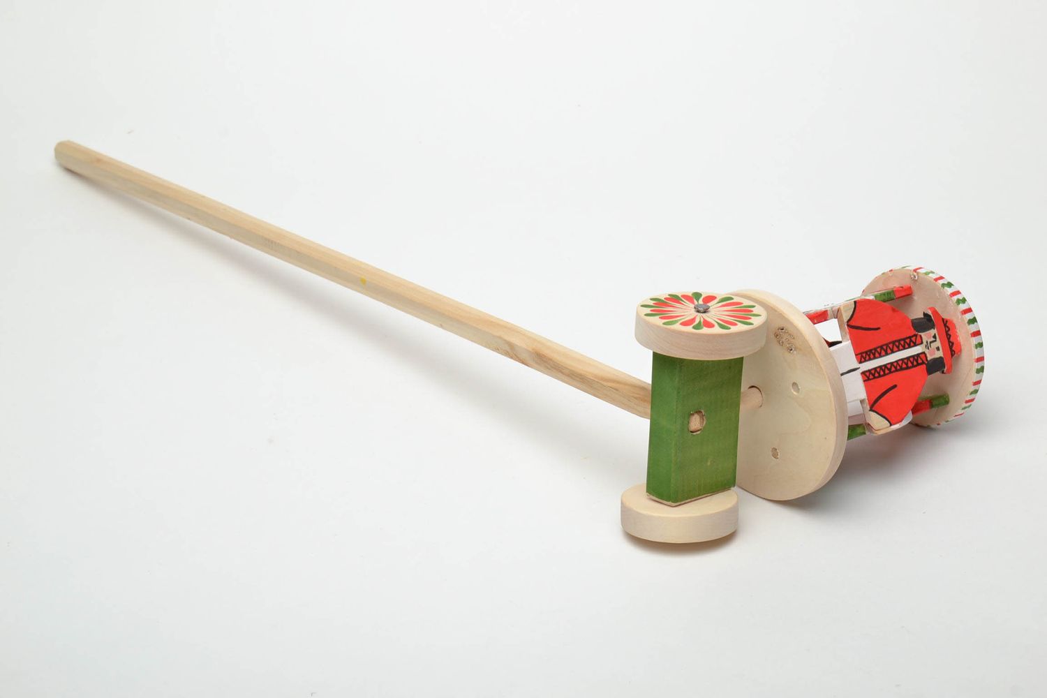 Wooden wheeled toy with Ukrainian ethnic painting The Hutsuls photo 3