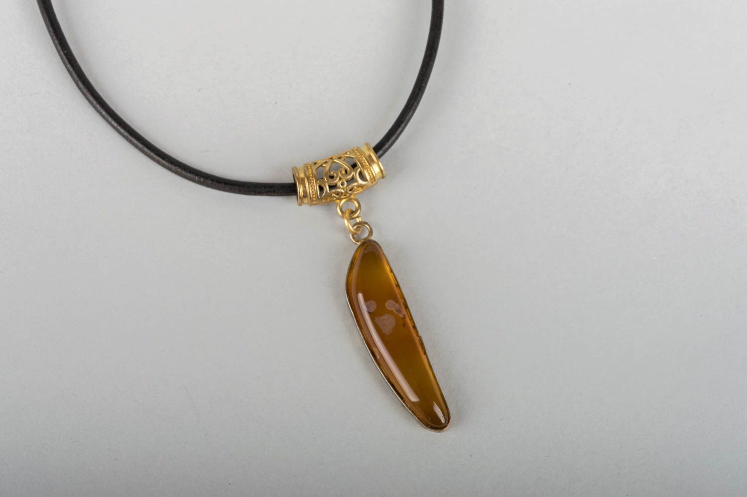 Beautiful stylish handmade neck pendant with natural stone on leather cord photo 3