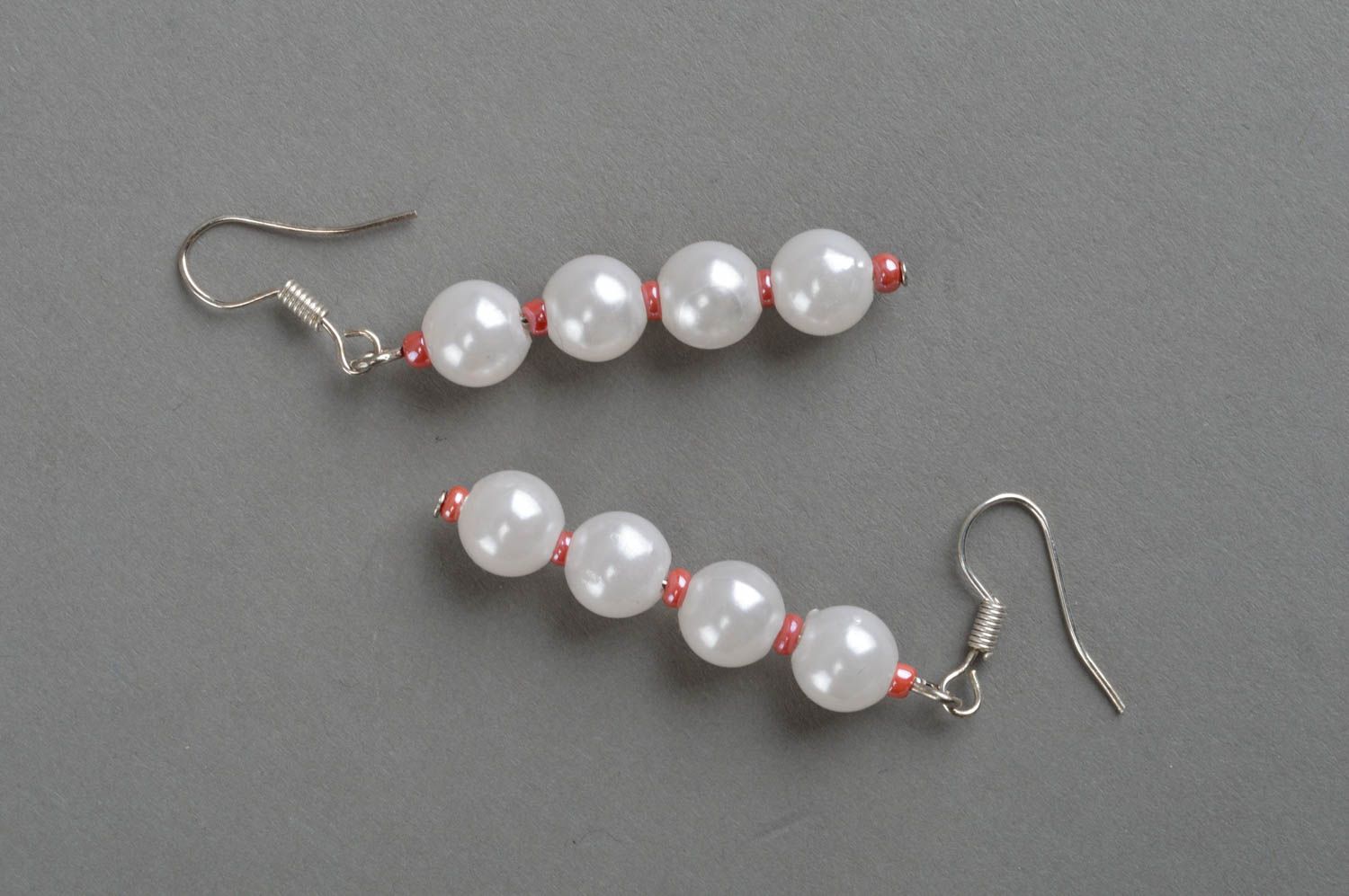 Handmade female earrings festive white beaded jewelry stylish accessories photo 2