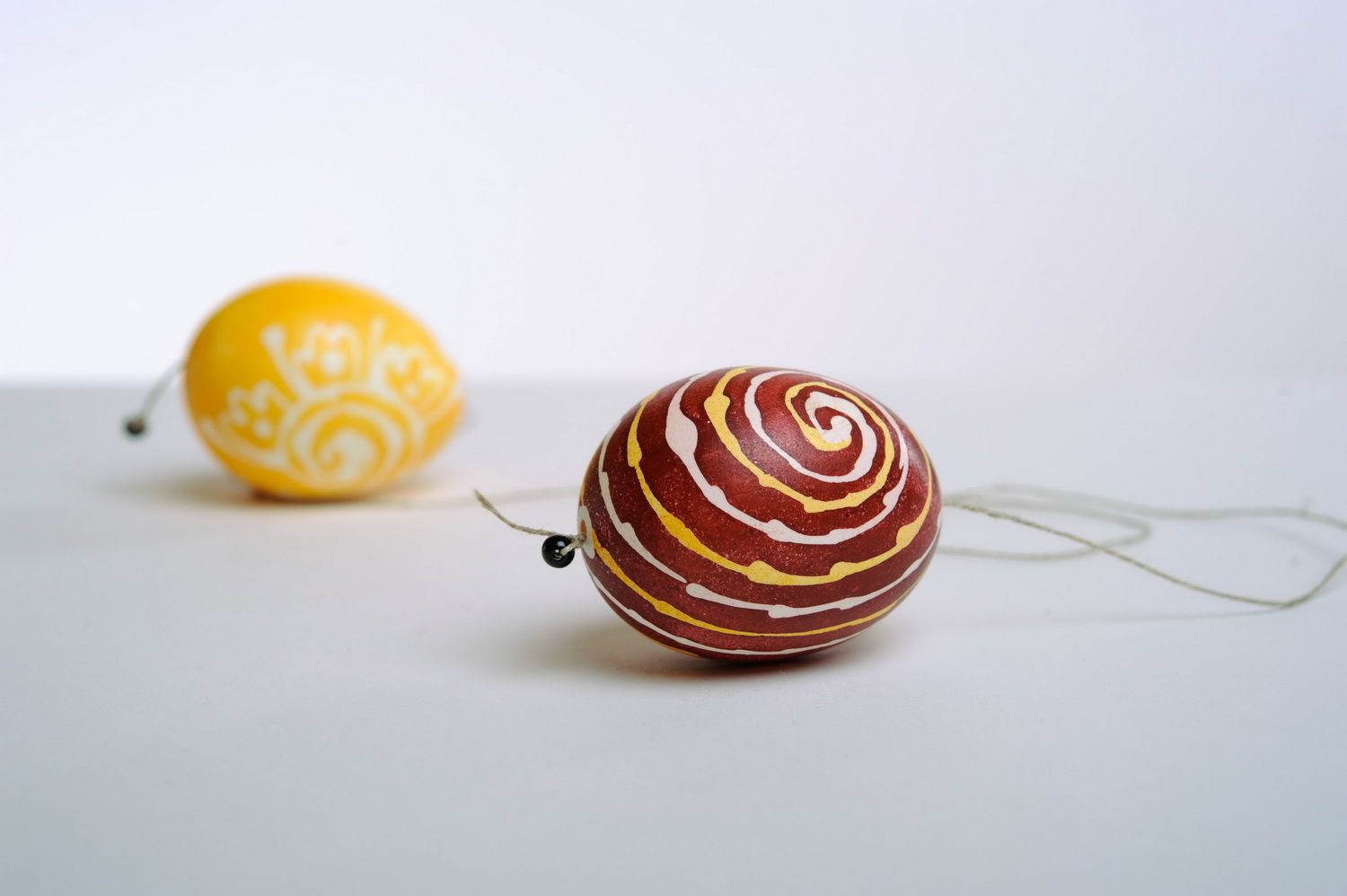 Interior pendant made of two painted eggs photo 2