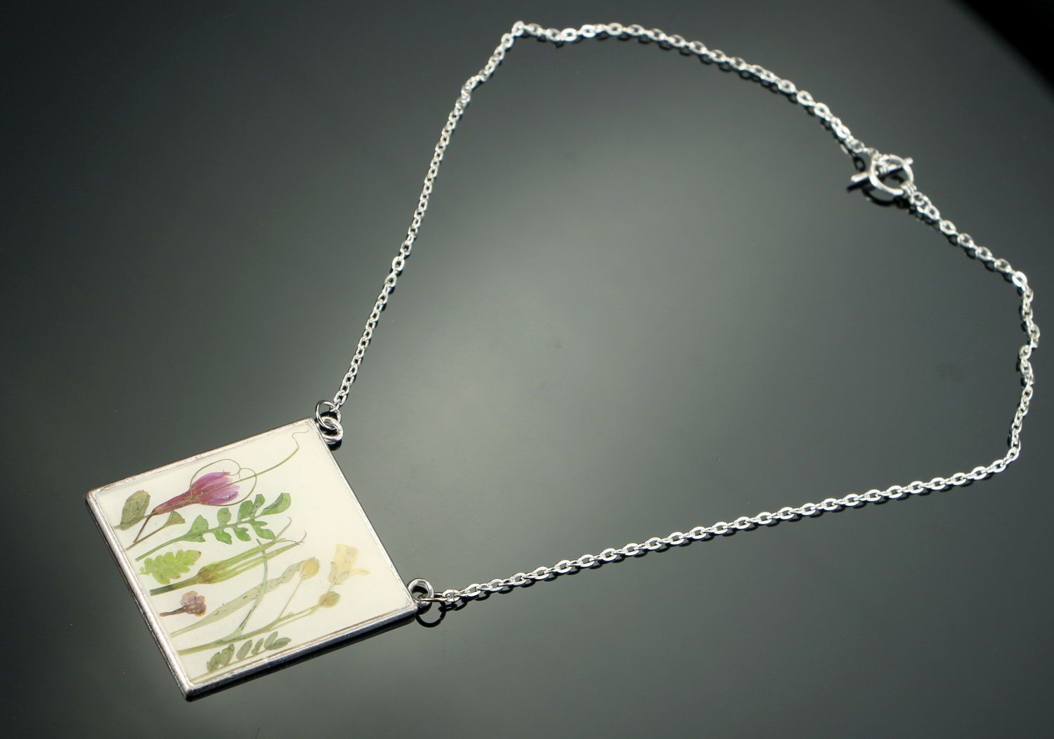 Necklace made of flower arrangement, coated with epoxy resin photo 2