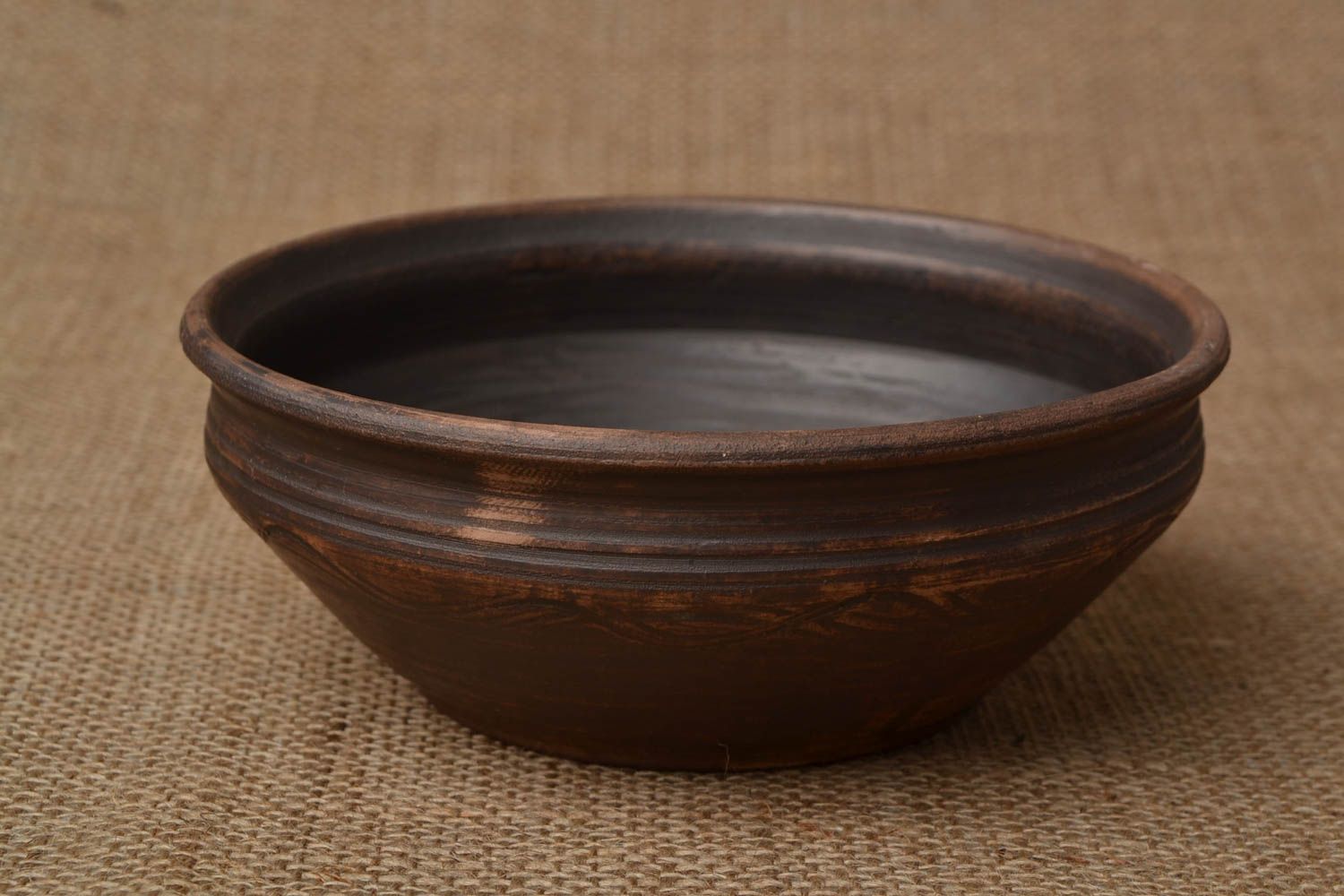 Handmade dark brown ceramic bowl kilned with the use of milk for 700 ml photo 1