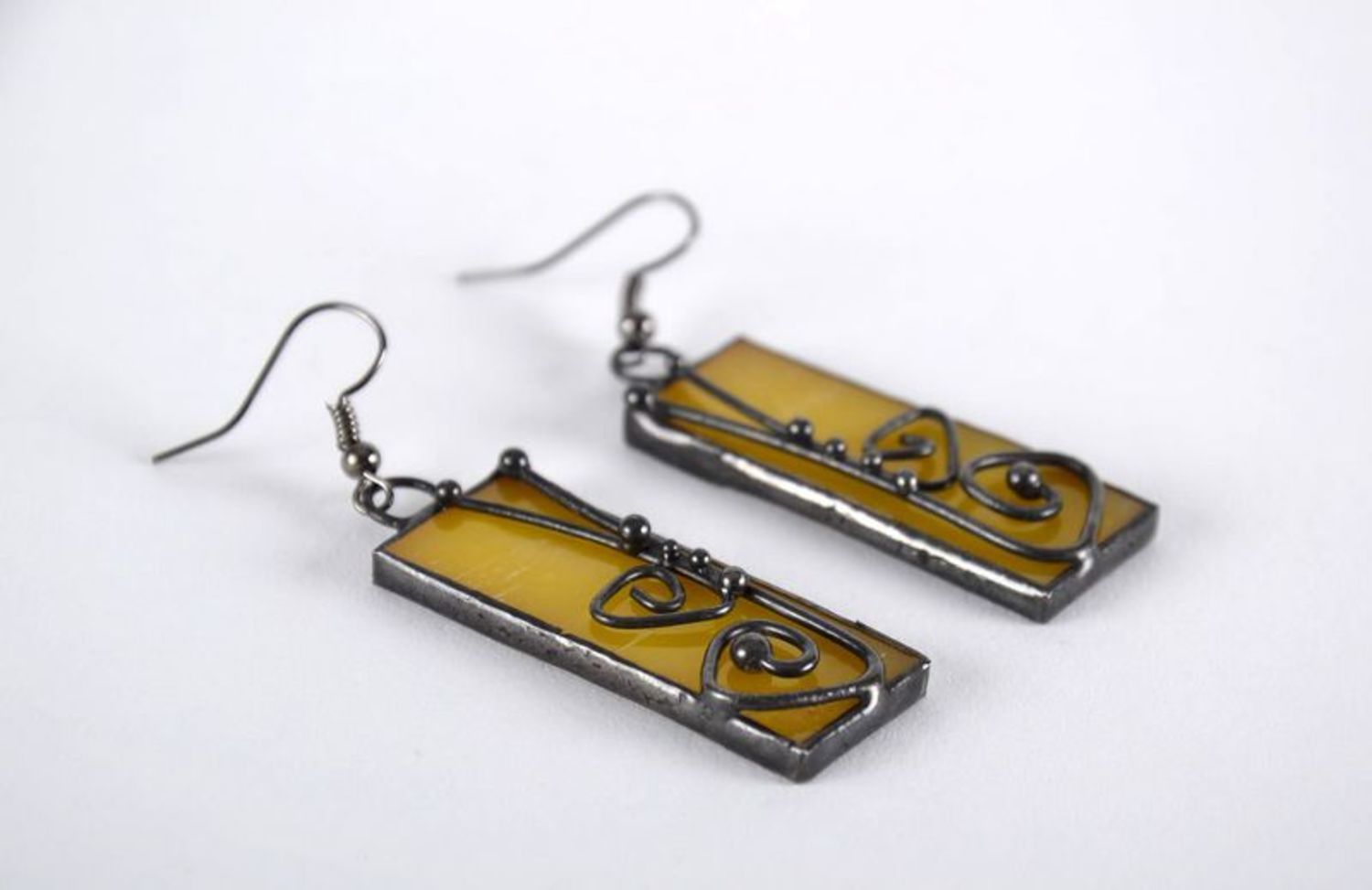Stained glass earrings made of copper and glass photo 1