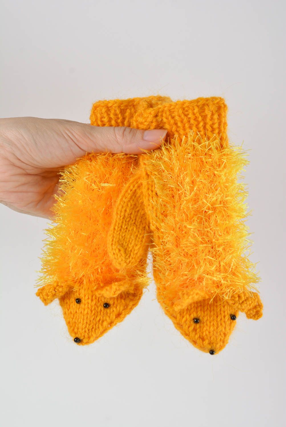 Bright handmade knitted yellow mittens made of wool warm soft winter accessory photo 4