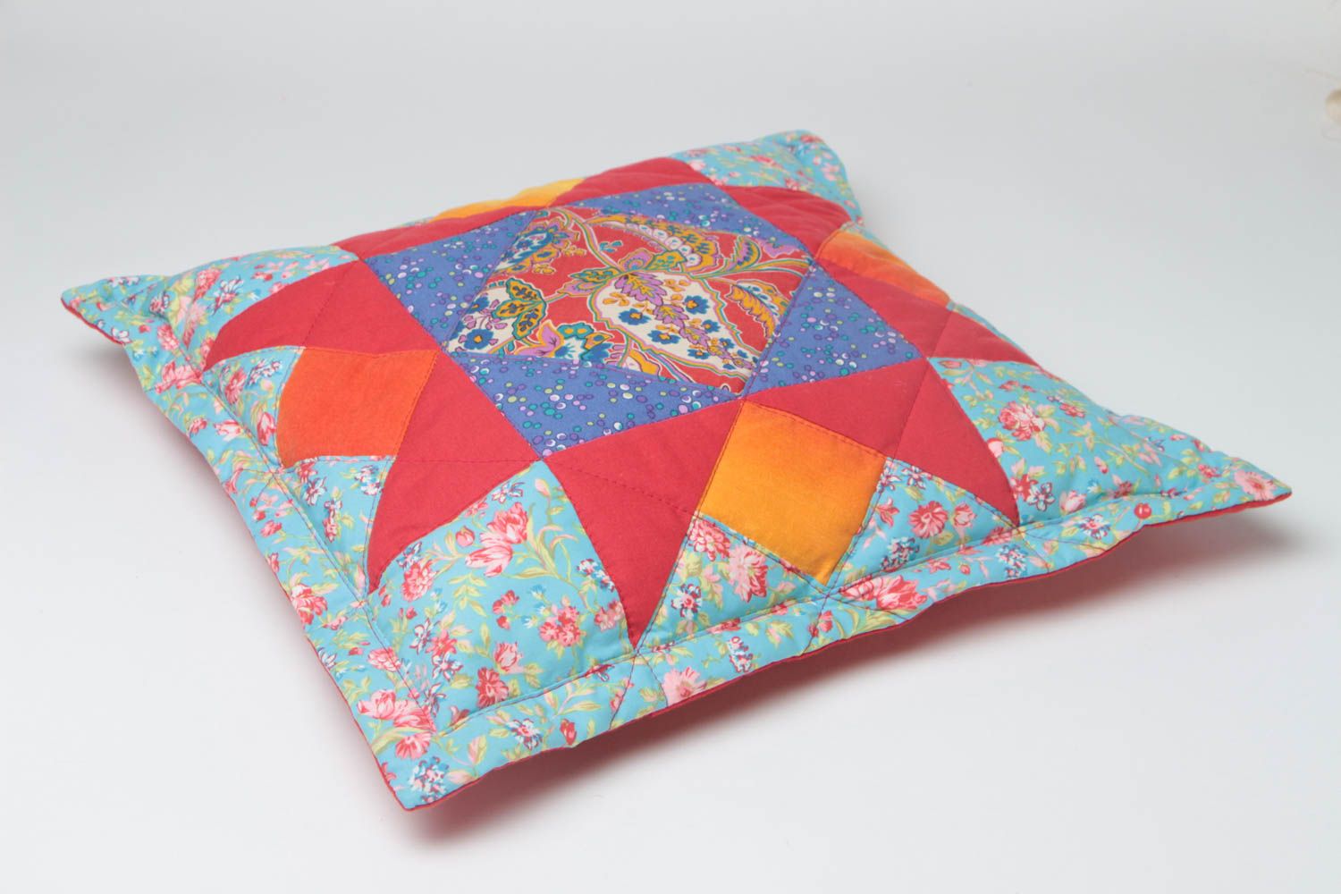 Beautiful handmade designer patchwork accent pillow sewn of cotton fabric photo 2