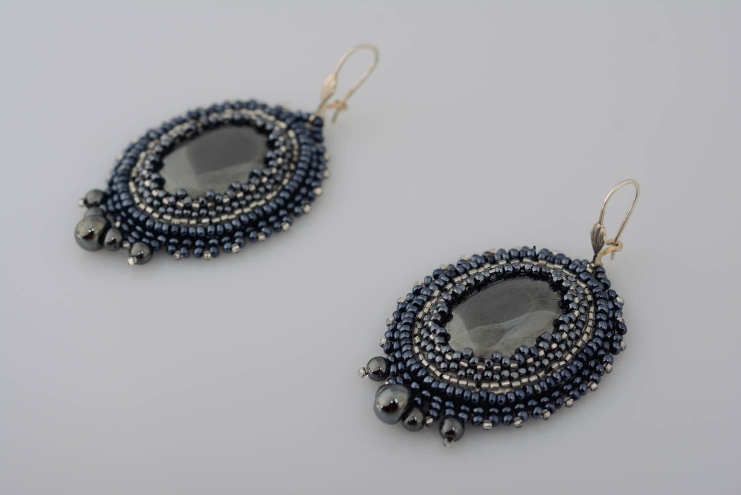 Handmade evening oval dark dangling earrings with beads and natural stones photo 1