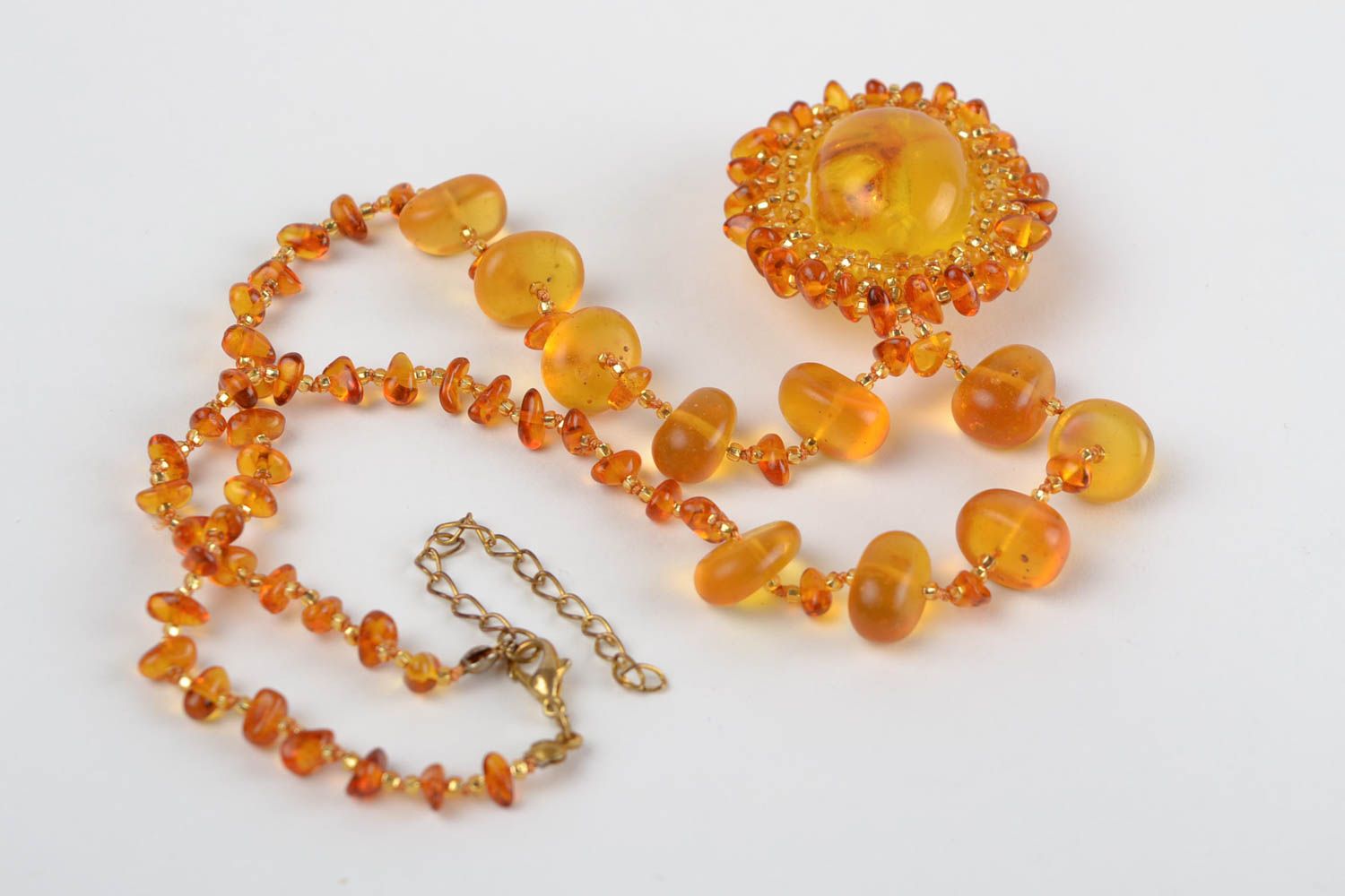Handmade cute long pendant made of beads and natural stones of amber color photo 5