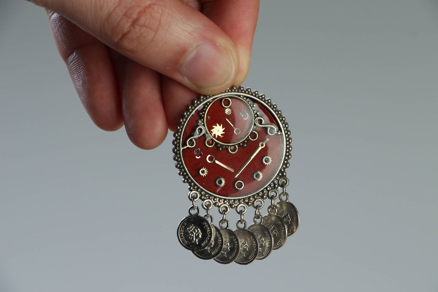 Red round steampunk pendant with charms photo 4