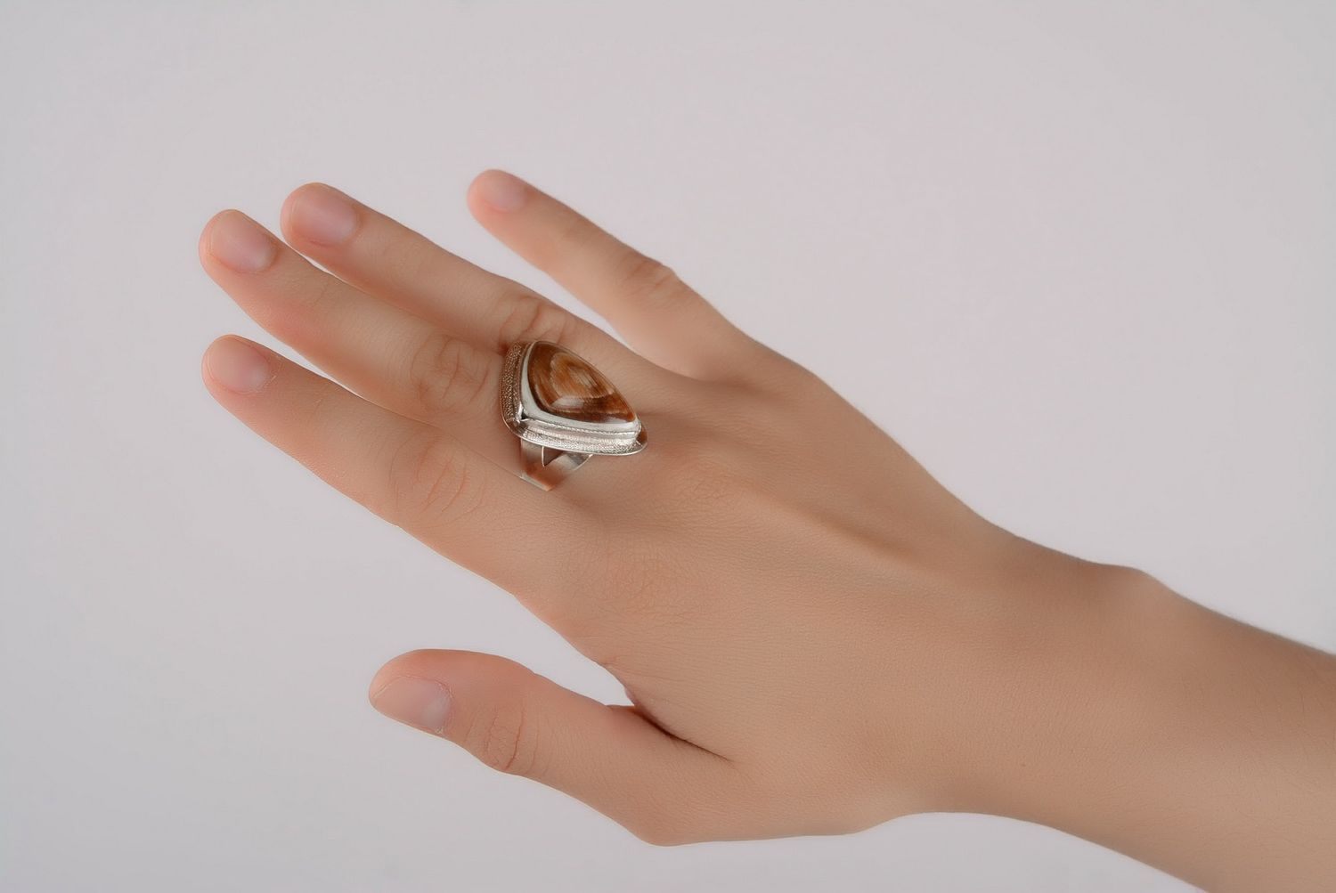 Silver ring with a cow horn photo 2