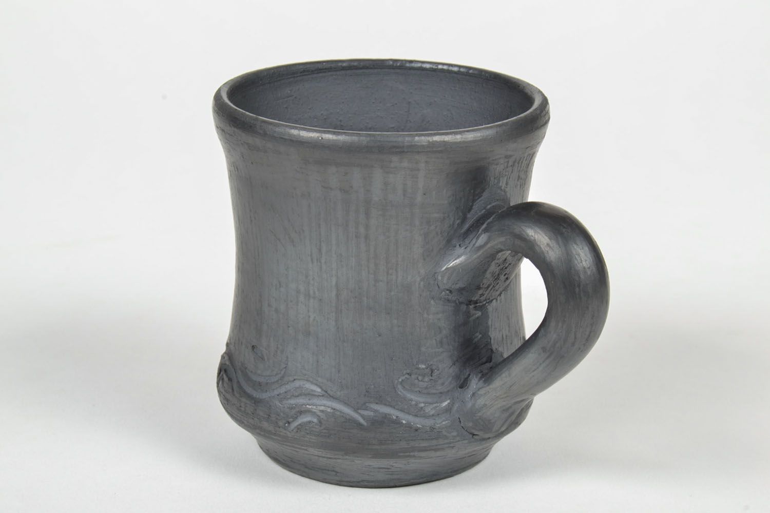 Black-smoked ceramic cup in rustic style with handle and no pattern photo 4