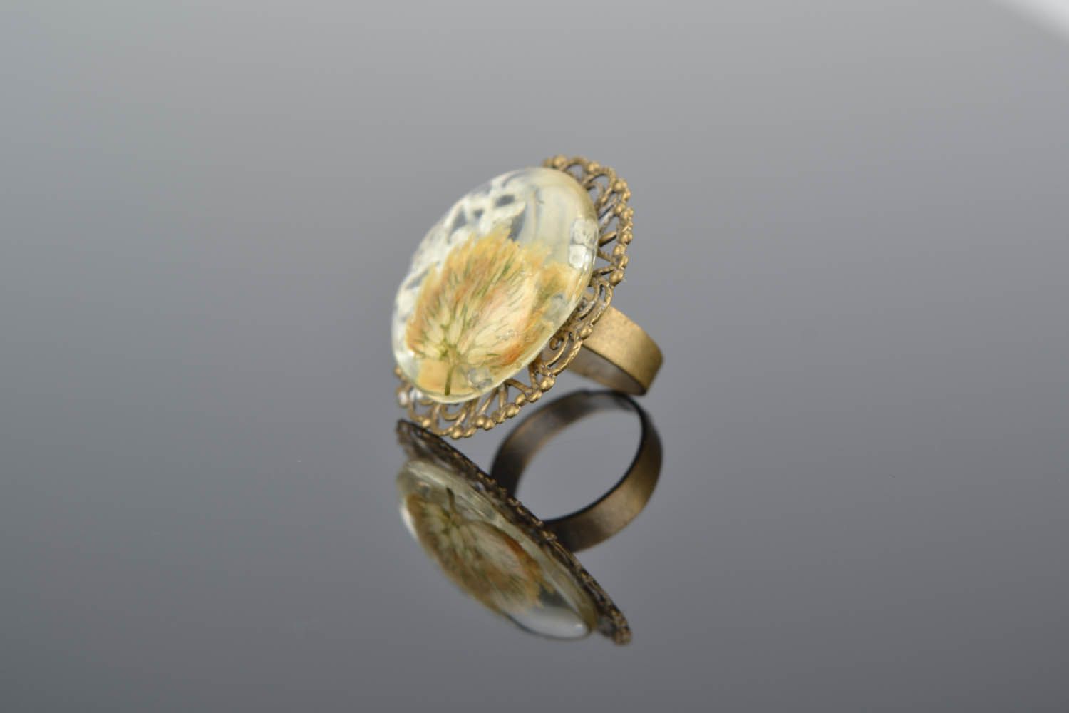 Ring with a dried flower photo 1