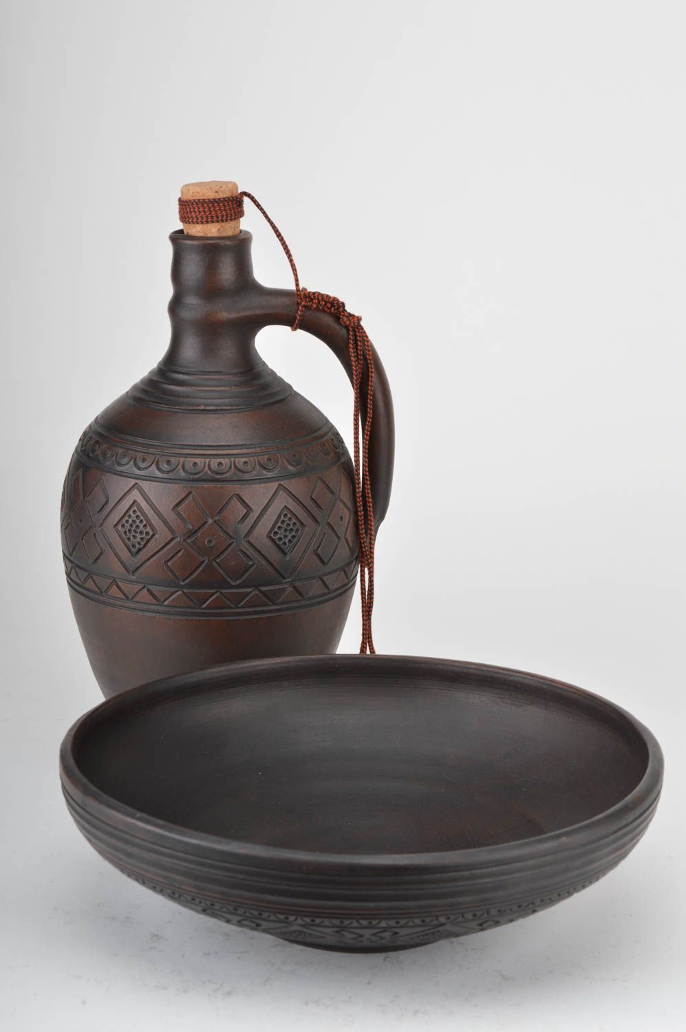 Set of handmade pottery kitchenware dark ceramic bottle with cork and fruit bowl photo 5