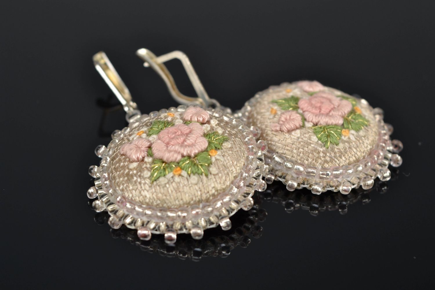 Round earrings with volume embroidery photo 1