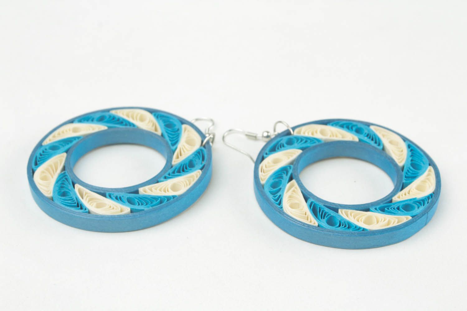 Round earrings made using the quilling technique  photo 4