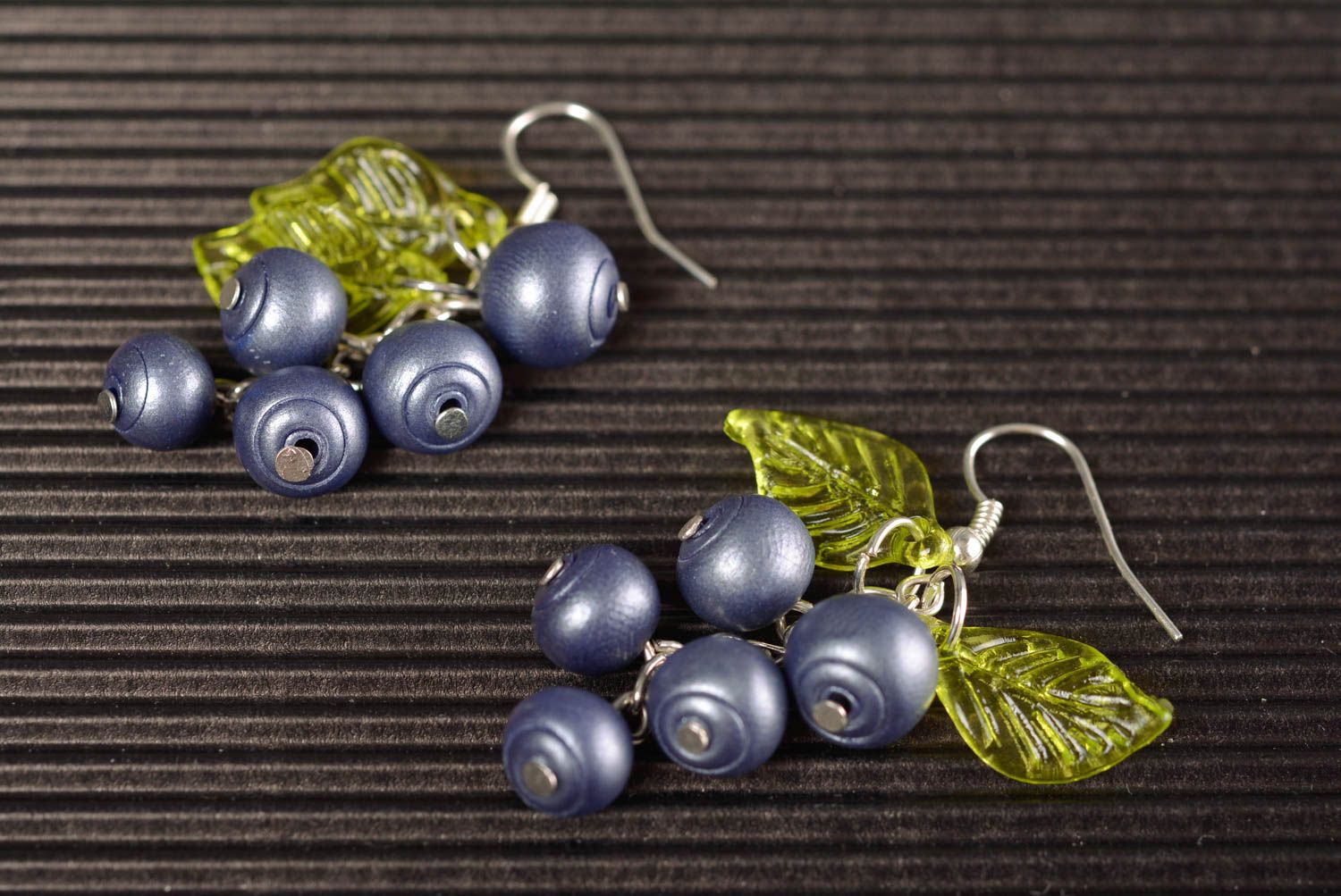 Handmade designer dangle earrings with bark blue polymer clay beads and leaves photo 1