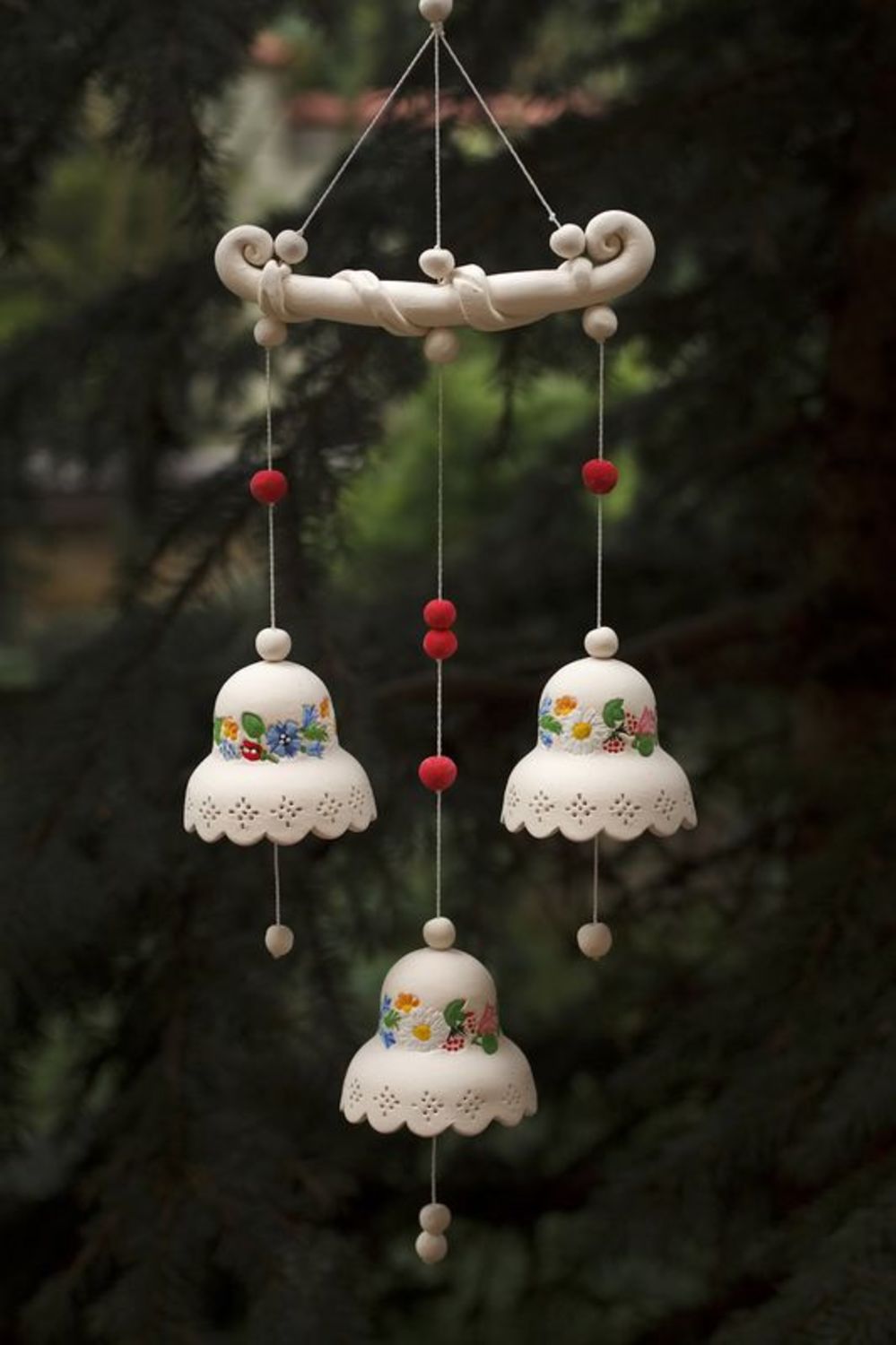 Ceramic bells with a cord photo 1