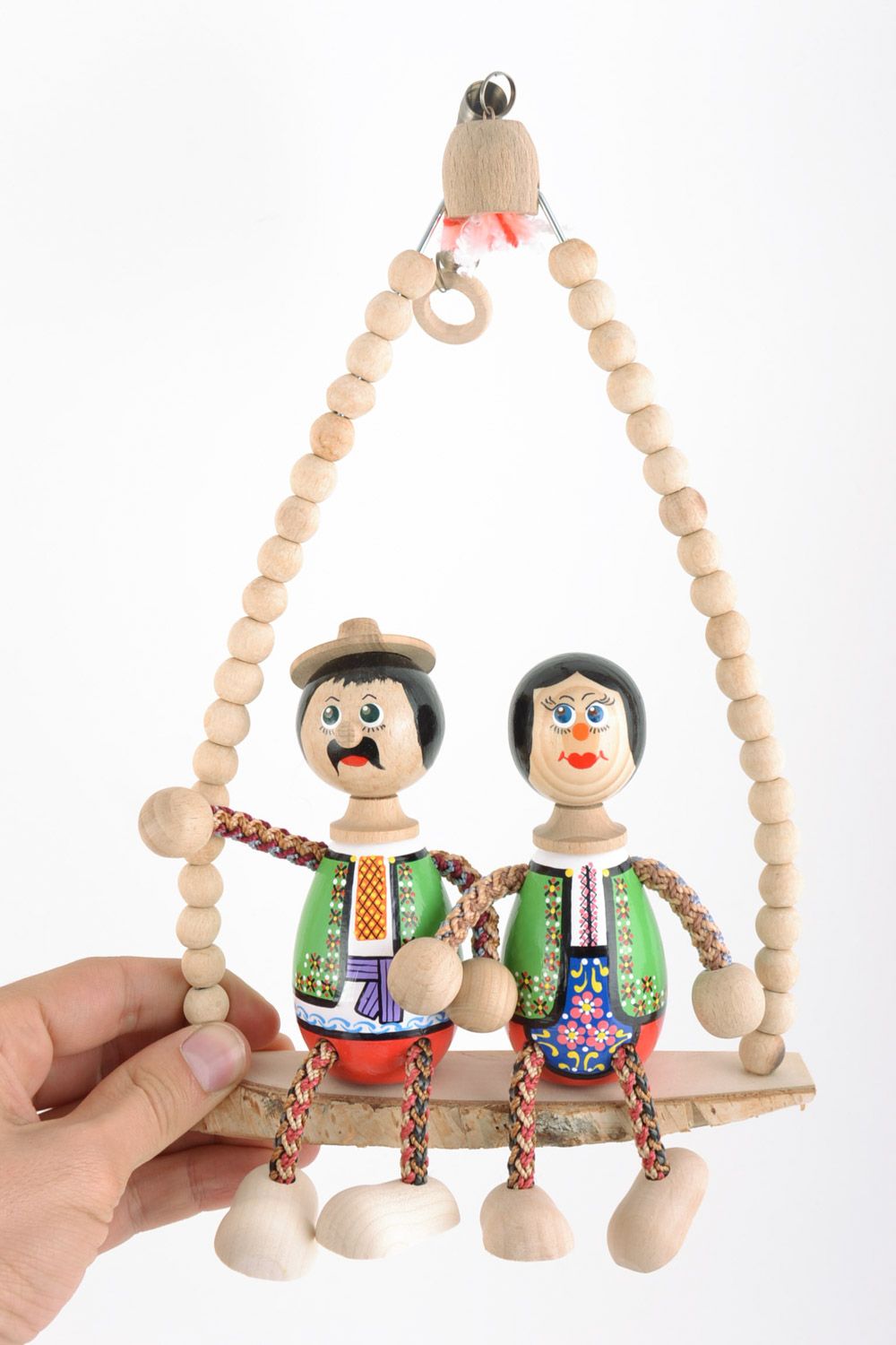 Hübsches umweltfreundliches Spielzeug Puppe aus Holz für Kinder und Interieur foto 2
