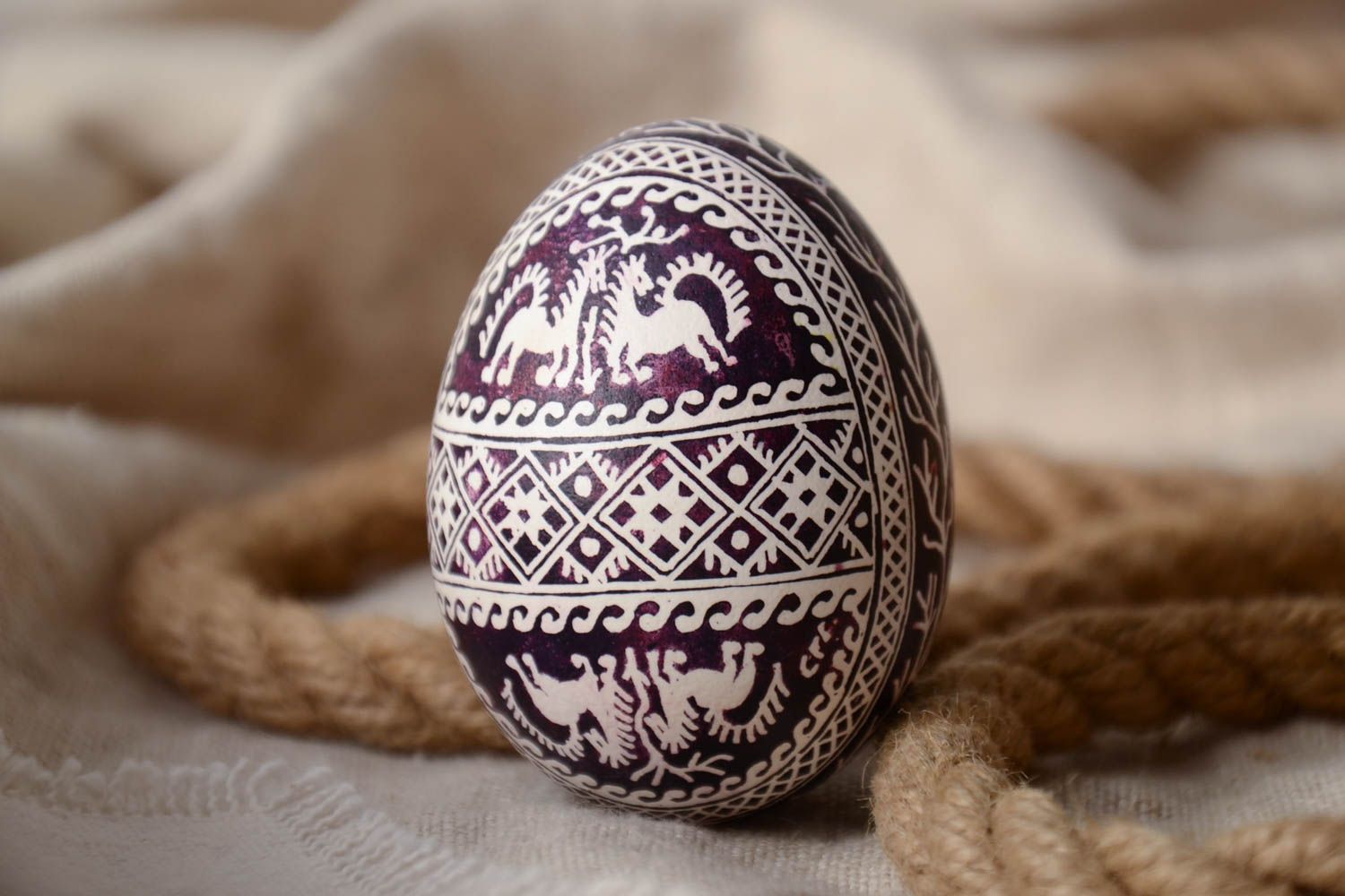 Handmade traditional painted chicken egg violet and white with horses pattern photo 1