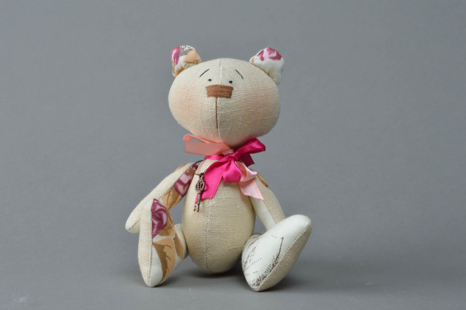 Handmade designer soft toy sewn of satin and linen fabrics Bear with pink bow photo 1