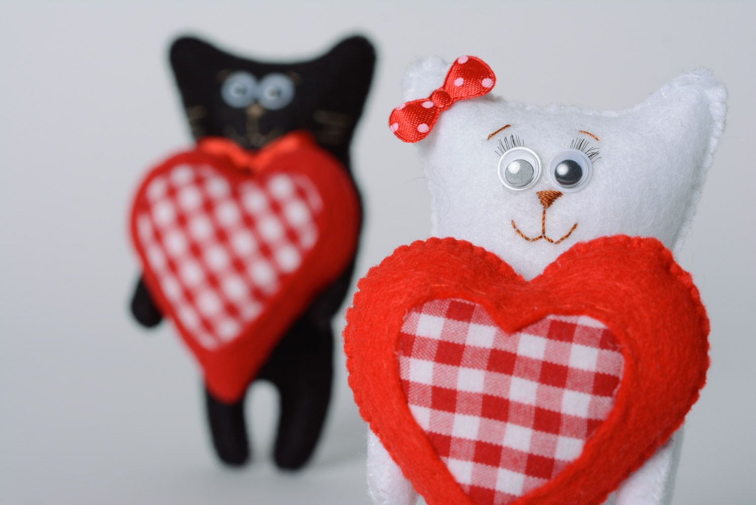 Handmade decorative cute soft toy made of felt and holofiber cats with hearts 2 pieces photo 2