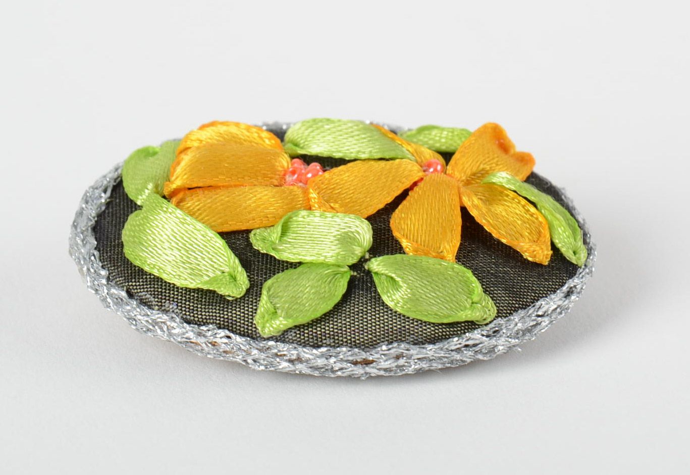 Handmade textile brooch with yellow flowers embroidered using satin ribbons photo 3
