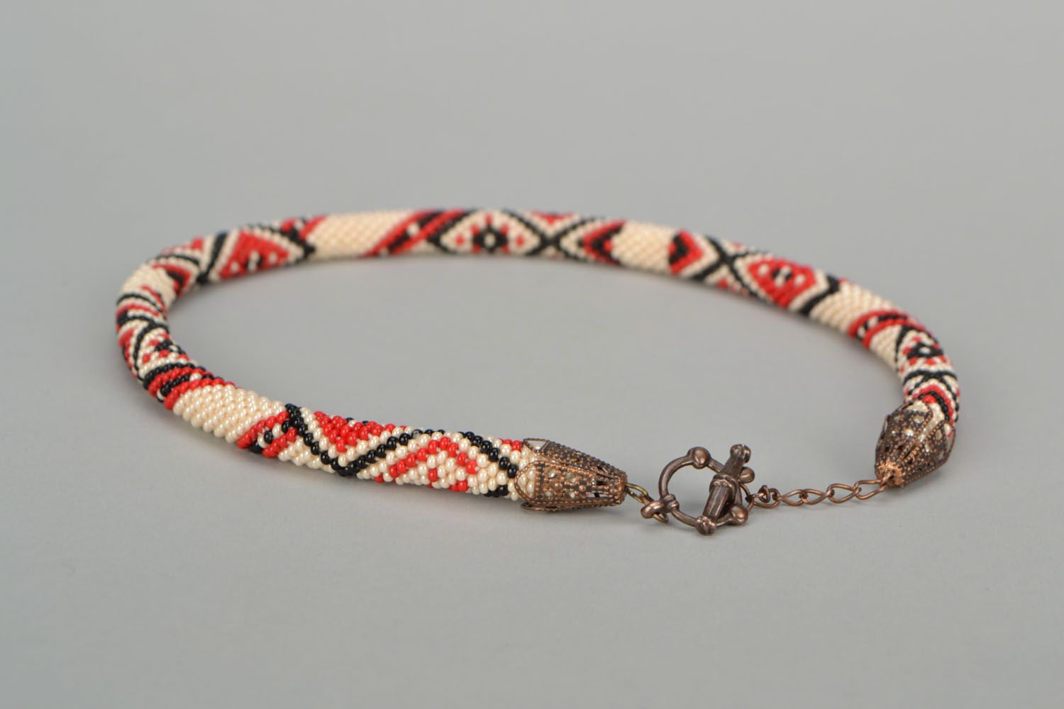 Beaded cord necklace with ethnic ornament photo 5