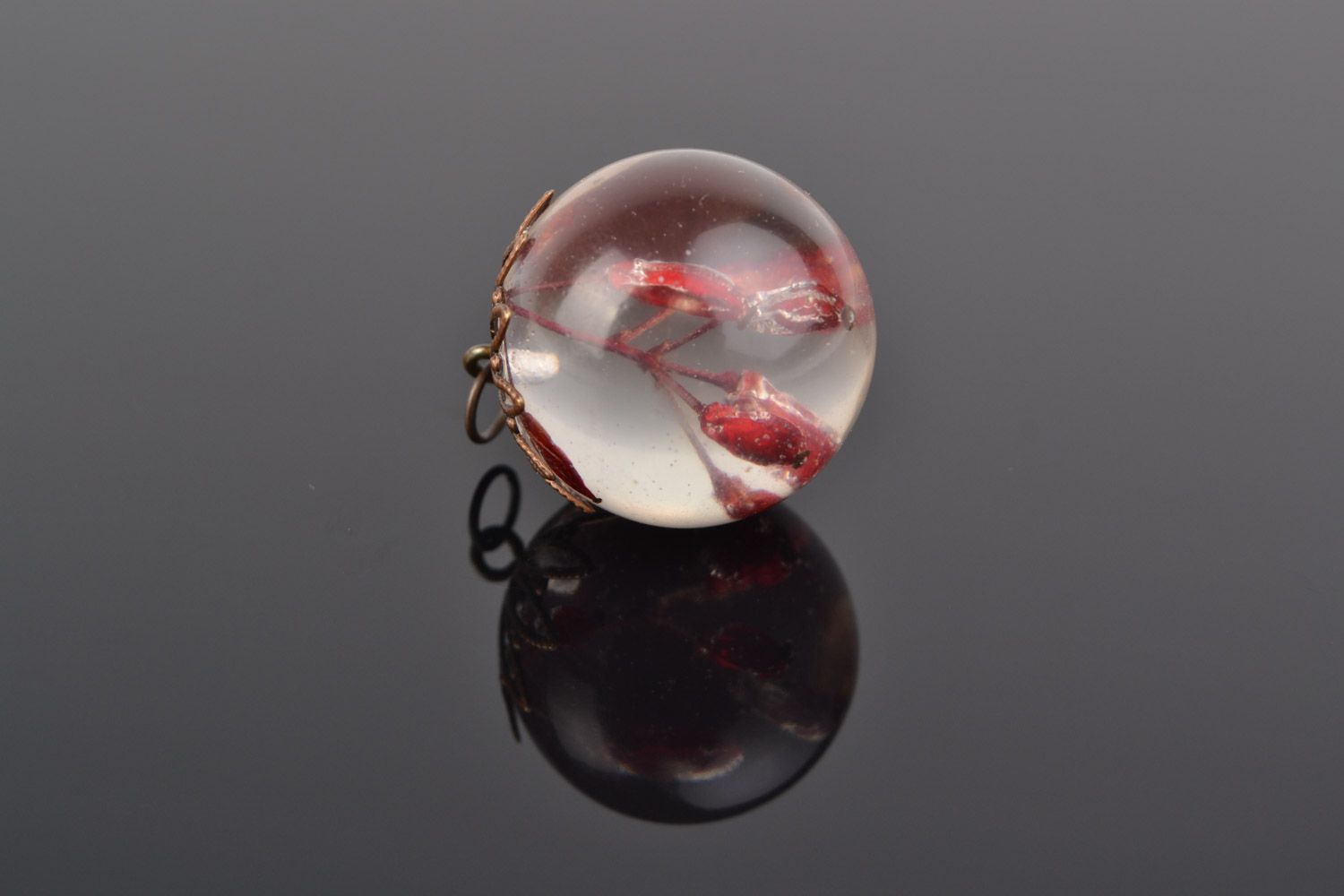 Transparent handmade neck pendant with real berries coated with epoxy photo 1