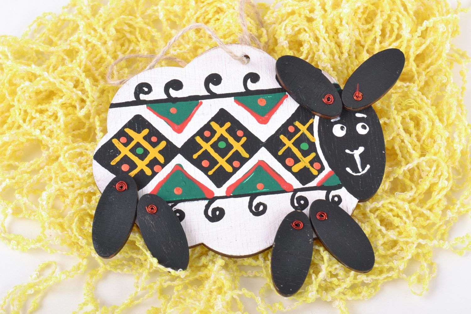 Handmade decorative wooden wall hanging toy Lamb painted with ethnic ornaments photo 1