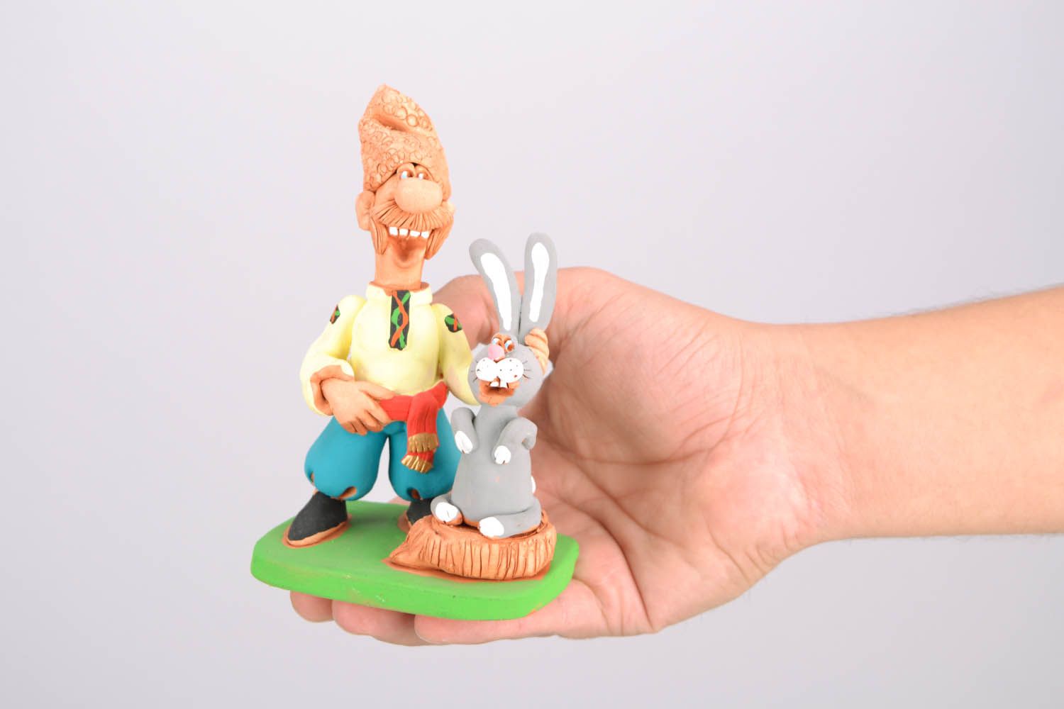 Unusual figurine Cossack with a Bunny photo 2