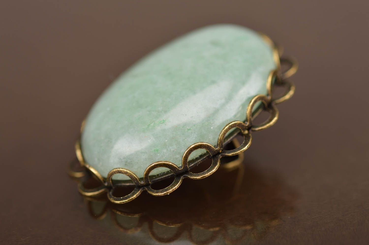 Broche ovale en pierre couleur menthe support métal faite main Œil de serpent photo 5