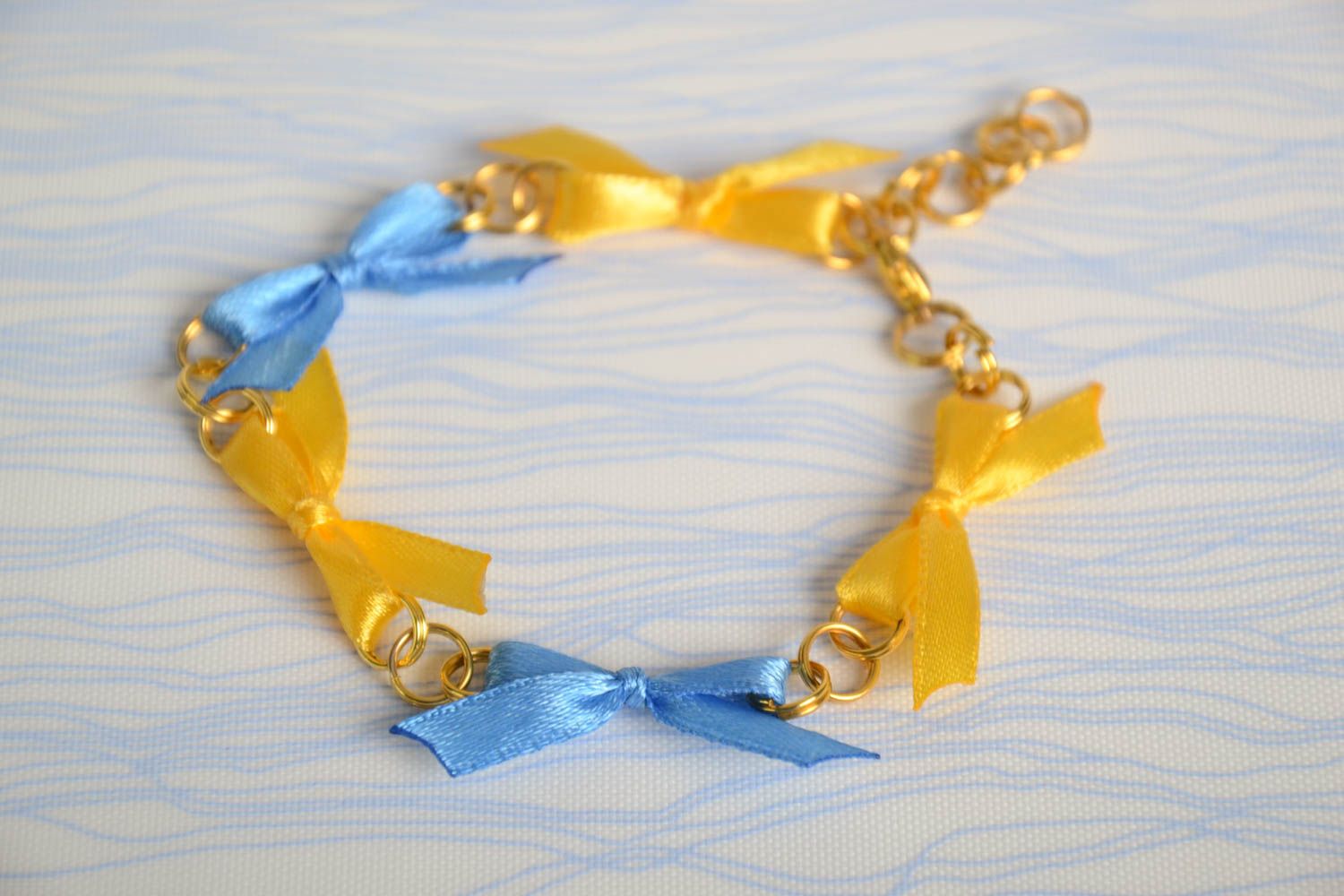 Blue and yellow handmade satin ribbon bow bracelet photo 1