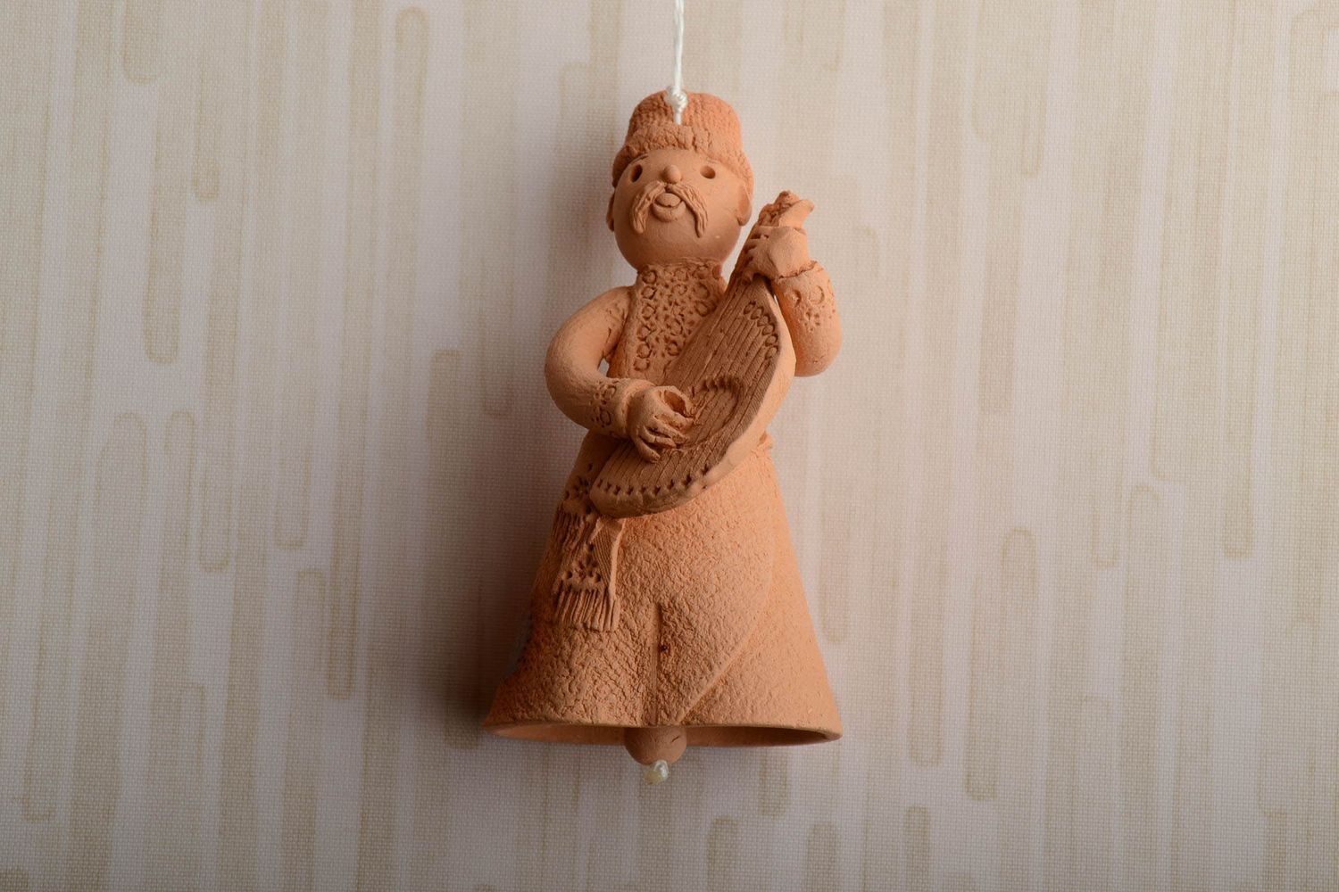 Designer ceramic bell in the shape of musician photo 1