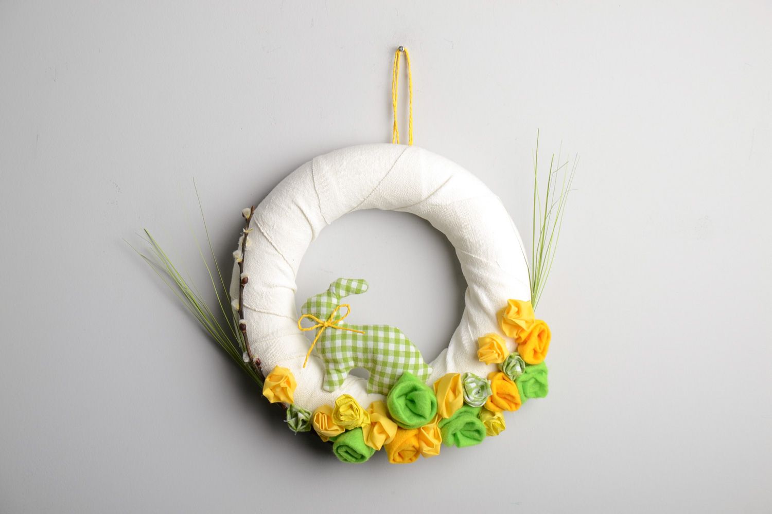 Handmade festive Easter door wreath made of fabric for decoration of interior photo 1