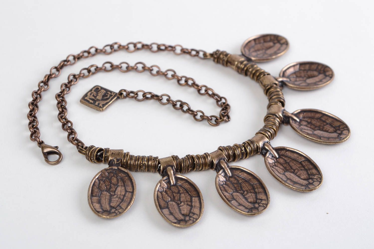Handmade designer metal necklace of bronze color in ethnic style photo 5