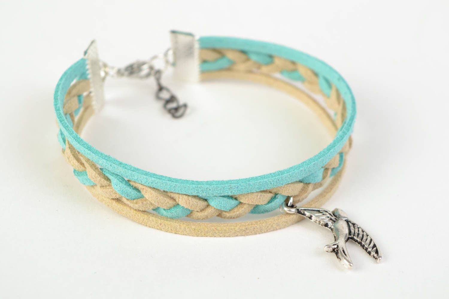 Beautiful handmade woven suede cord bracelet of pastel colors with bird charm photo 3