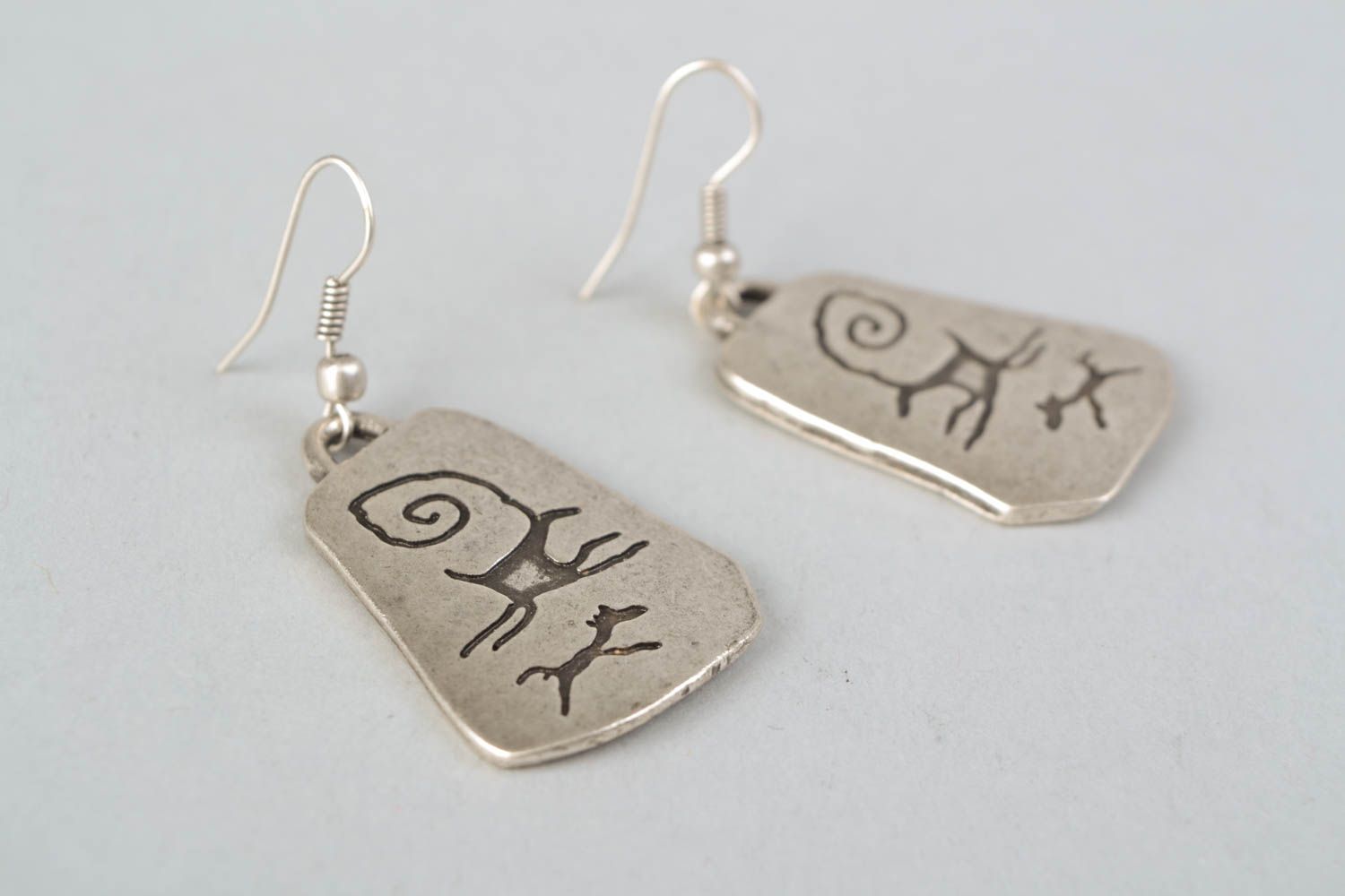 Handmade metal earrings with patterns photo 4