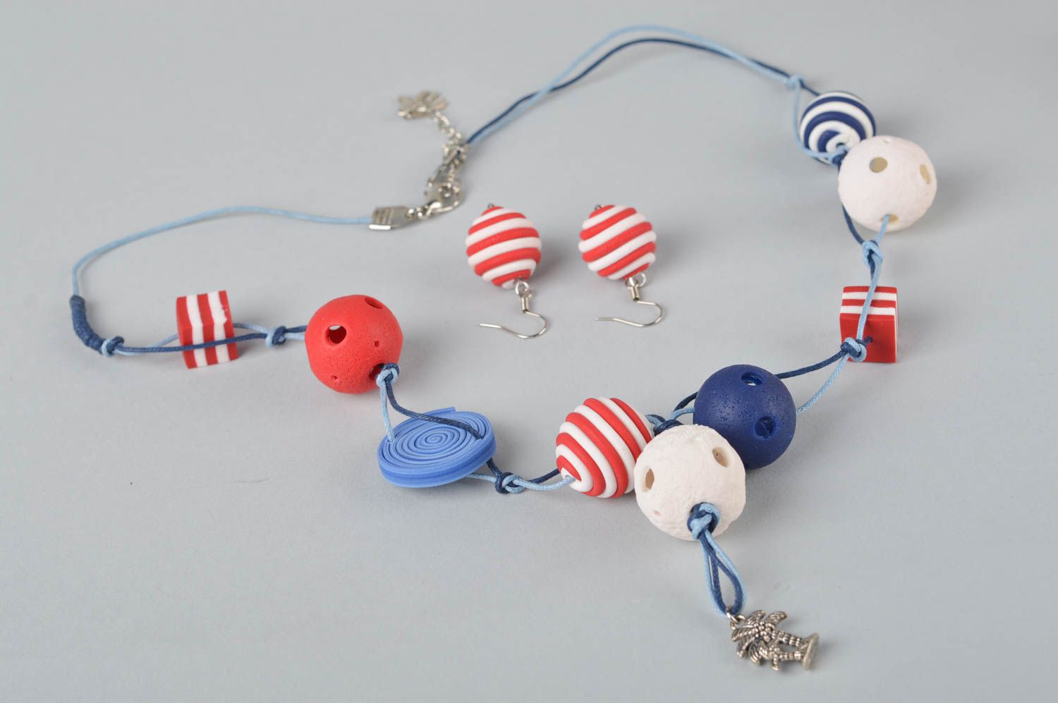 Ceramic bright beads' necklace on three cords with white, red, blue large beads photo 2