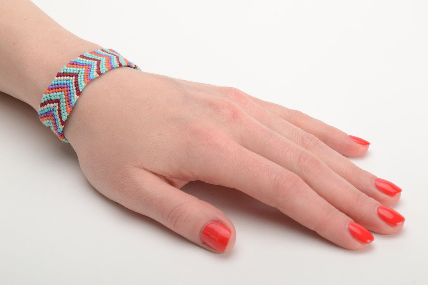 Handmade stylish friendship wrist bracelet woven of colorful embroidery floss photo 5