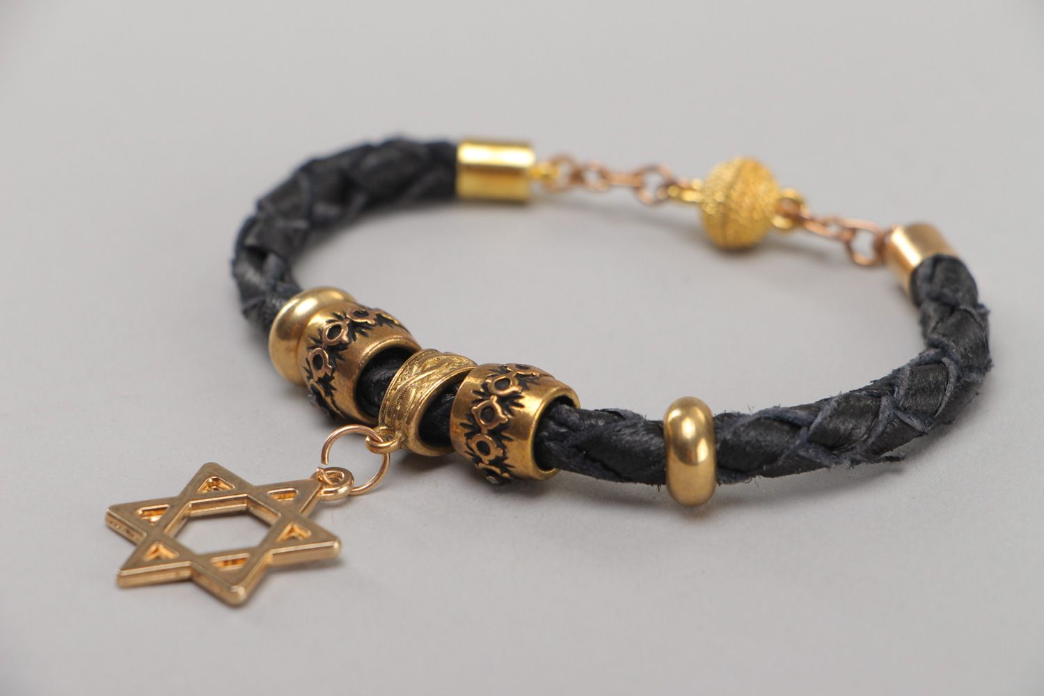 Handmade wrist bracelet woven of genuine leather with metal charm Star of Judah photo 2