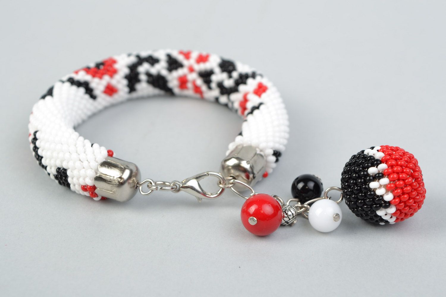 Handmade white beaded cord wrist bracelet with ornament in ethnic style photo 3