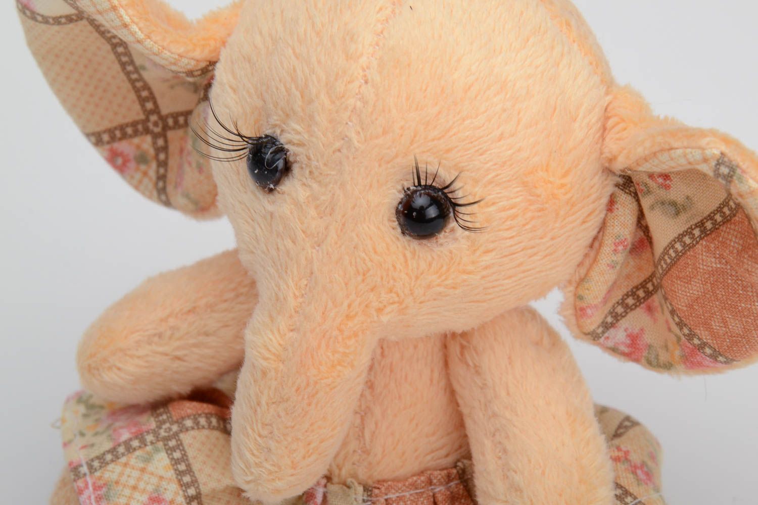 Handmade small plush soft toy elephant girl of peach color in skirt photo 3